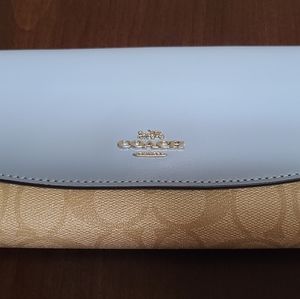 Coach signature and baby blue wallet with checkbook sleeve